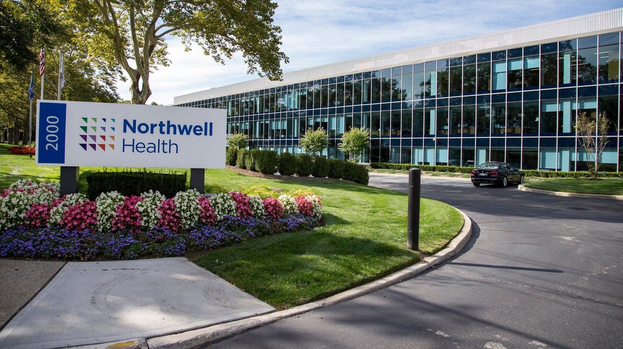 Northwell Health sign in front of a glass office building